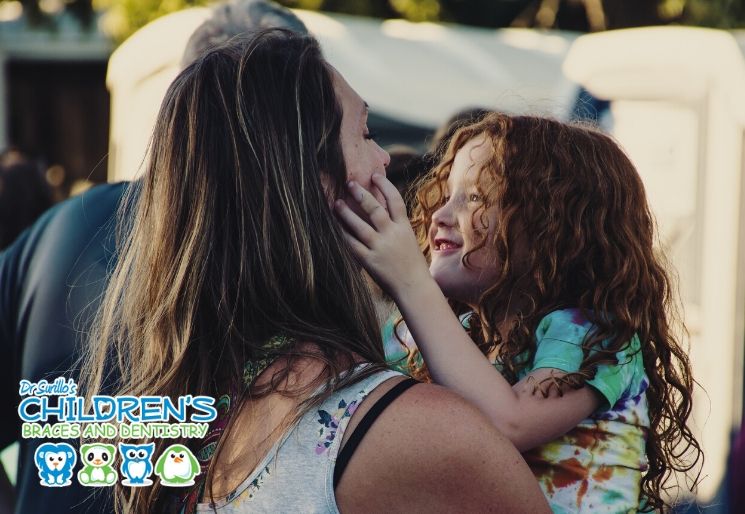 Braces for kids mother and daughter